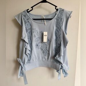 Pretty Anthropologie Light Blue Top with side ties NEVER WORN Small 🩵